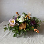 Gorgeous thanksgiving centerpiece made of local flowers from Rhode Island in a low and lush style