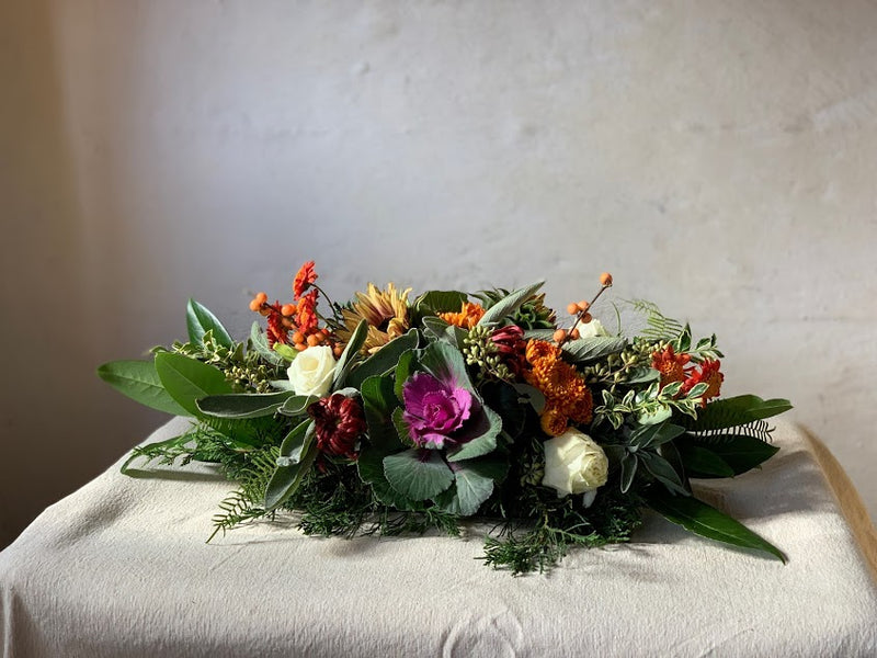 Gorgeous thanksgiving centerpiece made of local flowers from Rhode Island in a low and lush style